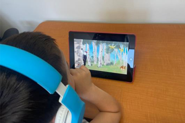 young child watching a tablet