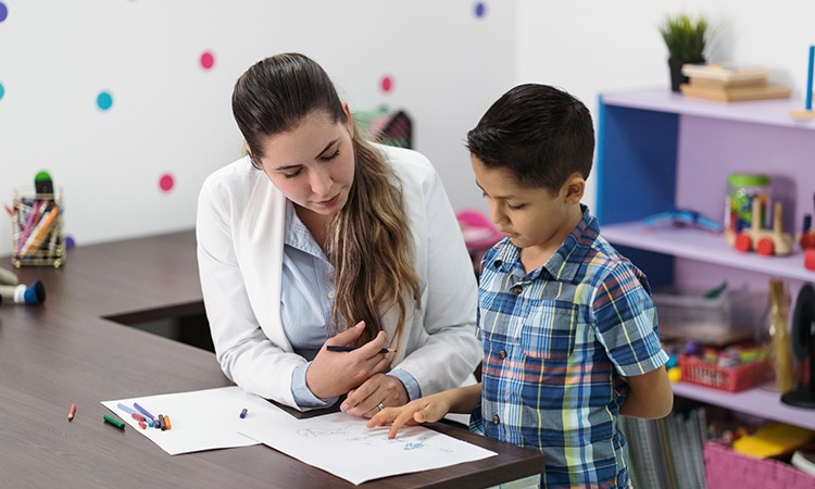 Clinician assessing a child